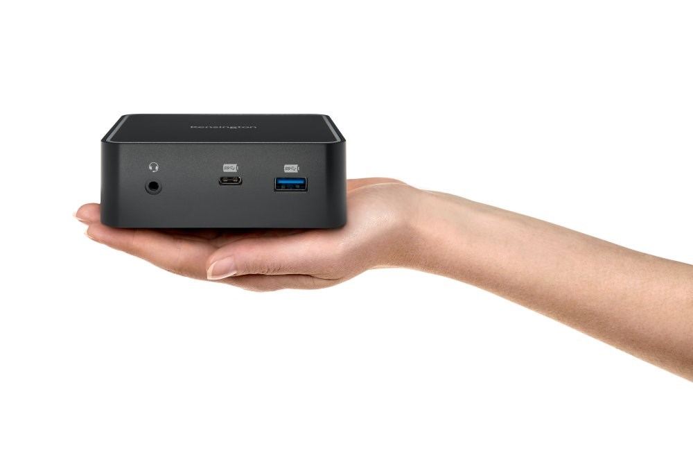 Person holding a Kensington Thunderbolt 3 40Gbps Dual 4K Nano Dock with 135W Adapter