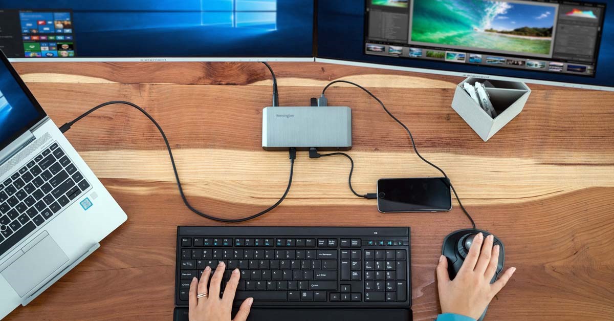 Person using Kensington Trackball with design software