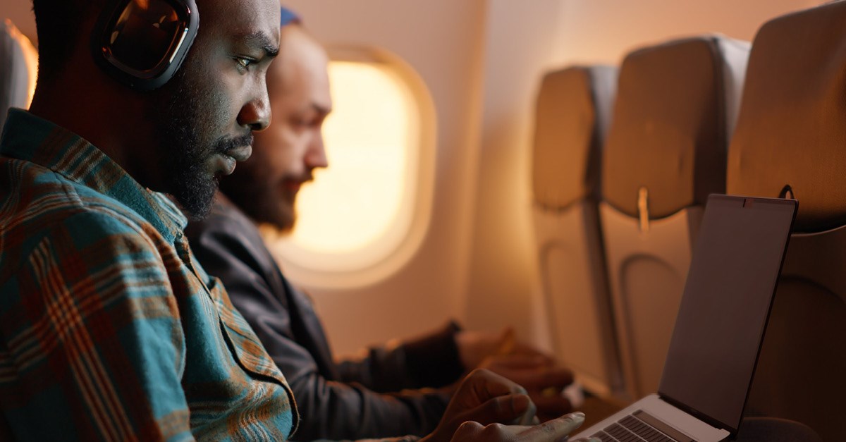 Privacy filter on a laptop screen while working on an airplane flight. 