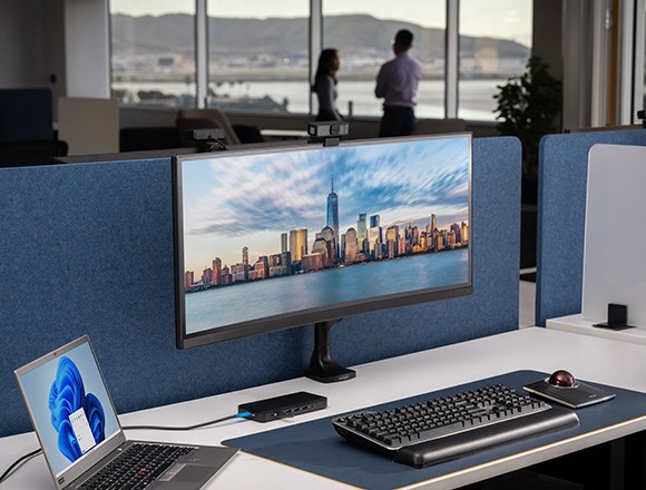 Desk setup with silent mechanical keyboard and other Kensington devices.