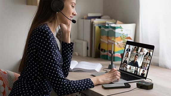 Woman using Kensington audio switch