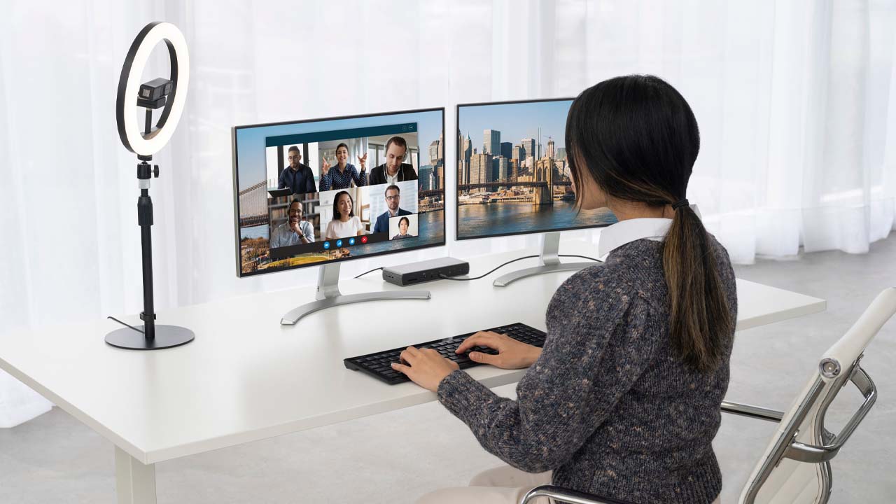 Woman using Kensington Webcam and Light Ring at desk