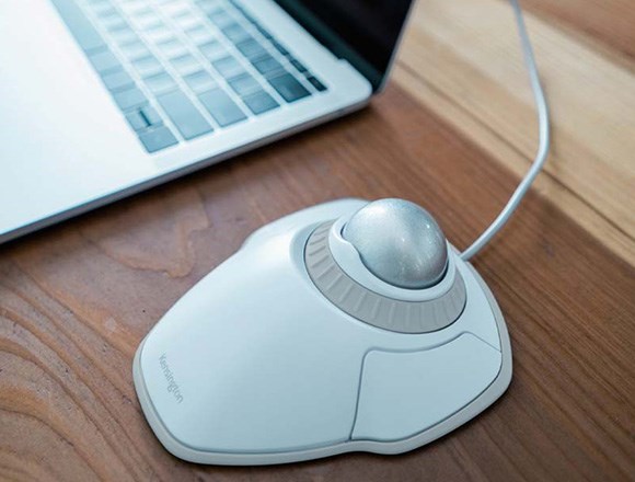 Orbit trackball on desk.