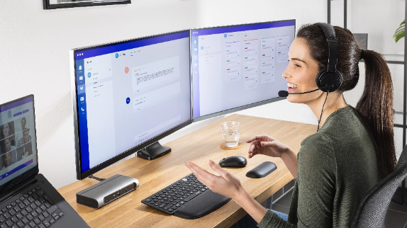 Woman working in home office with Kensington products