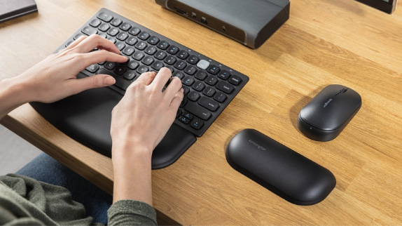 Closeup of hands on a Kensington wrist rest